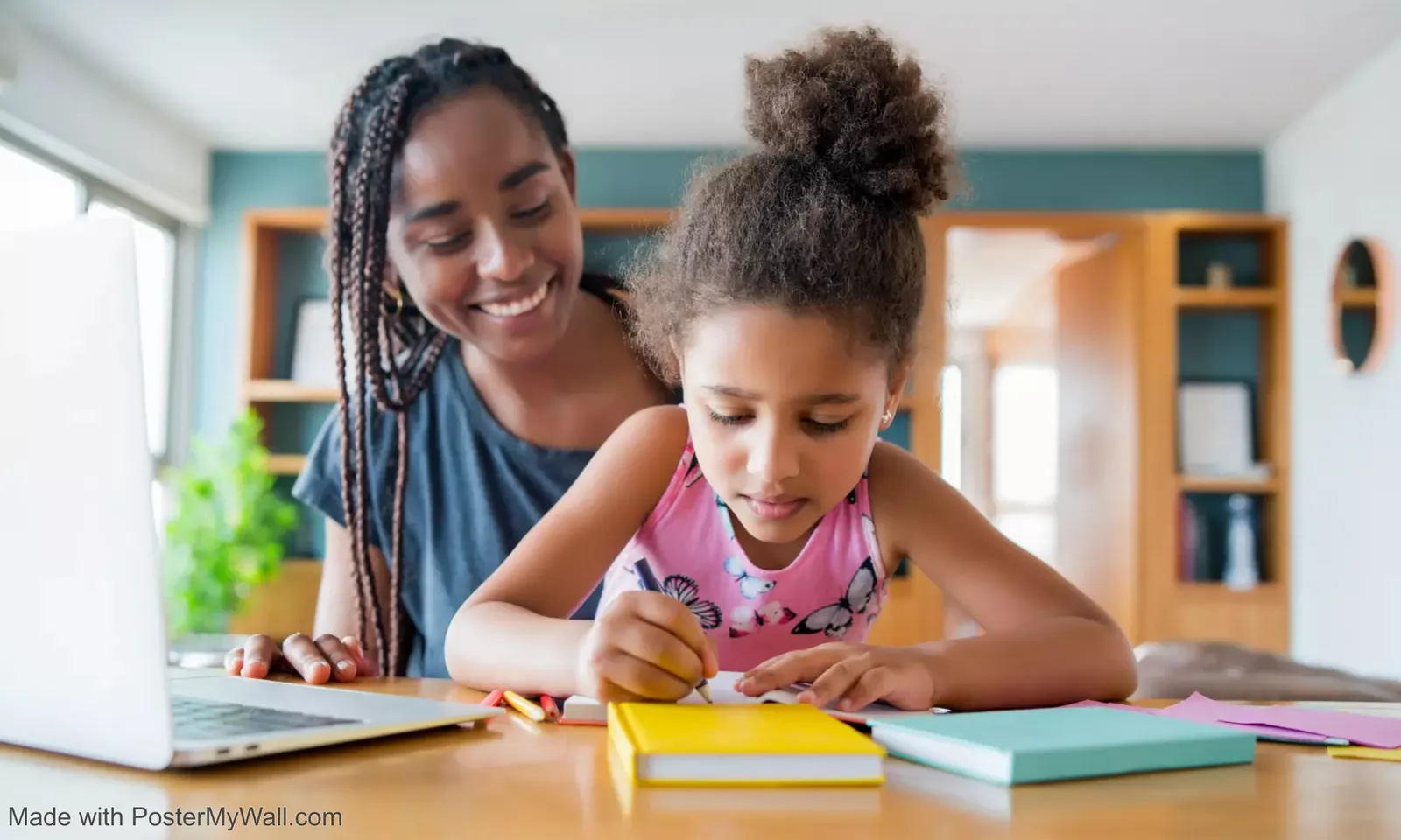 A tutor helping a child study at home in Nairobi
