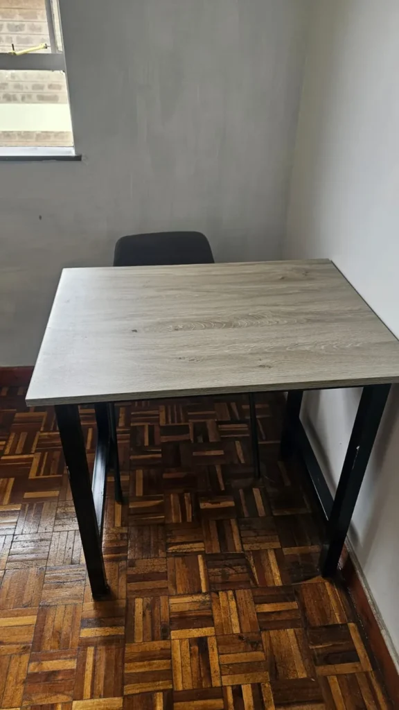 A quiet, personalised tuition desk at Cares Home-based Tuition, Nairobi